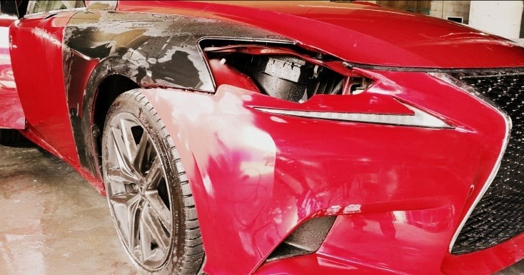Bumper and fender scratch repair on a red Lexus